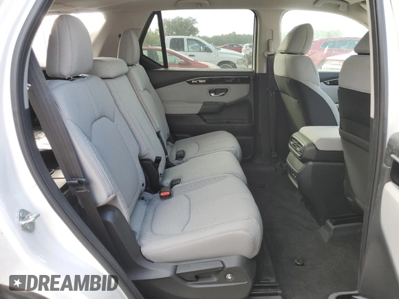 2023 Honda Pilot LX with VIN 5FNYG2H26PB014190, listed as a Copart auction lot 77021734 with 11,688 mi miles and Non Repairable. Bid and sale history available at carsss.com. Image 11.