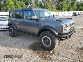 2024 Ford Bronco Badlands with VIN 1FMEE9BP4RLA21303, listed as a Copart auction lot 53457375 with 13,881 mi miles and Salvage title. Bid and sale history available at DreamBid. Image 4.
