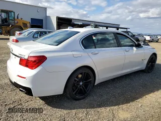 2011 BMW 7 Series 740Li with VIN WBAKB4C58BC573888, listed as a Copart auction lot 78736874 with 76,832 mi miles and Salvage Title. Bid and sale history available at DreamBid. Image 3.