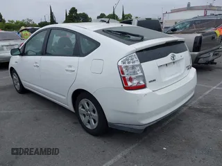 2007 Toyota Prius z VIN JTDKB20UX77550163, wystawiony jako IAAI lot #42379609 z przebiegiem 136 507 mil mil oraz . Historia ofert i sprzedaży dostępna na DreamBid. Obrazek 3.