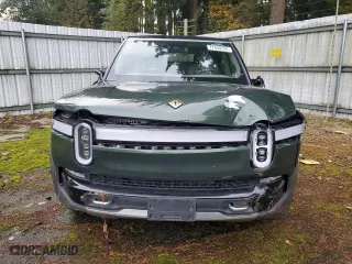 2023 Rivian R1S Adventure with VIN 7PDSGABA4PN014067, listed as a Copart auction lot 77630794 with 0 mi miles and Salvage Title. Bid and sale history available at carsss.com. Image 5.