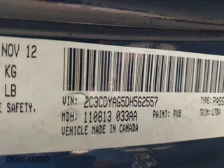 2013 Dodge Challenger SXT with VIN 2C3CDYAG5DH562557, listed as a IAAI auction lot 41694697 with 135,915 mi miles. Bid and sale history available at carsss.com. Image 9.