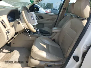 2005 Ford Escape XLT with VIN 1FMYU031X5KB24232, listed as a Copart auction lot 74798104 with 166,828 mi miles and Salvage Title. Bid and sale history available at carsss.com. Image 7.