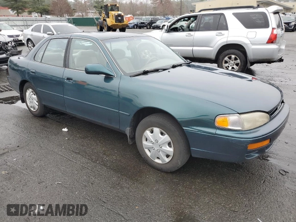 1996 Toyota Camry DX with VIN 4T1BG12K5TU670189, listed as a Copart auction lot 52913255 with 156,737 mi miles and Clean Title. Bid and sale history available at carsss.com. Image 4.
