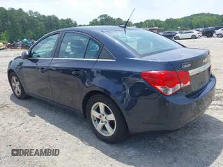 2014 Chevrolet Cruze 1LT with VIN 1G1PC5SB6E7226990, listed as a IAAI auction lot 42490123 with 125,256 mi miles and . Bid and sale history available at DreamBid. Image 3.