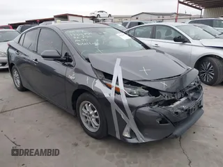 2018 Toyota Prius Plus with VIN JTDKARFPXJ3087064, listed as a IAAI auction lot 41433495 with 118,298 mi miles and . Bid and sale history available at DreamBid. Image 1.