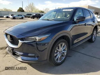 2020 Mazda CX-5 Grand Touring with VIN JM3KFBDM9L0761167, listed as a Copart auction lot 53275315 with 51,440 mi miles and Salvage Title. Bid and sale history available at DreamBid. Image 1.