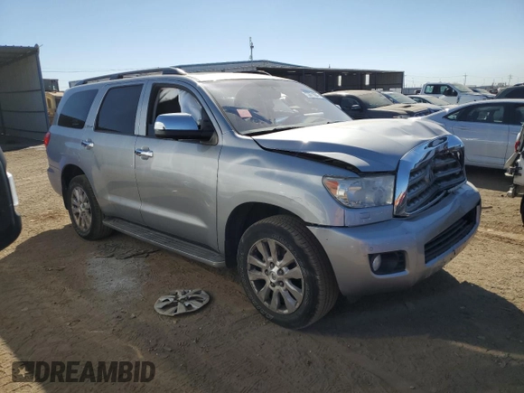 2014 Toyota Sequoia Platinum with VIN 5TDDW5G17ES104467, listed as a Copart auction lot 73671604 with 73,629 mi miles and Salvage Title. Bid and sale history available at carsss.com. Image 4.