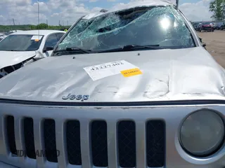 2014 Jeep Patriot Latitude with VIN 1C4NJRFB0ED549410, listed as a IAAI auction lot 42227402 with 139,908 mi miles and . Bid and sale history available at DreamBid. Image 10.