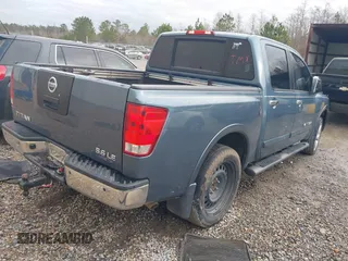 2010 Nissan Titan SE with VIN 1N6BA0ED1AN304375, listed as a IAAI auction lot 41384892 with 241,626 mi miles. Bid and sale history available at carsss.com. Image 4.
