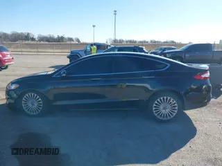 2016 Ford Fusion Titanium with VIN 3FA6P0K95GR135766, listed as a IAAI auction lot 41735040 with 99,256 mi miles. Bid and sale history available at carsss.com. Image 14.