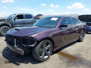 2021 Dodge Charger R/T with VIN 2C3CDXCT2MH574377, listed as a IAAI auction lot 42760667 with 49,295 mi miles and . Bid and sale history available at DreamBid. Image 18.