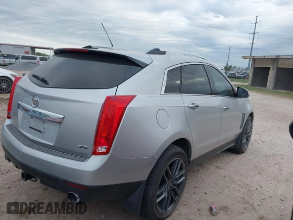2015 Cadillac SRX Luxury Collection with VIN 3GYFNBE39FS535642, listed as a IAAI auction lot 41939207 with 109,842 mi miles. Bid and sale history available at carsss.com. Image 4.