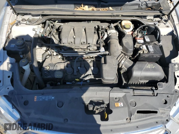 2015 Ford Taurus SE with VIN 1FAHP2D84FG149799, listed as a Copart auction lot 88993345 with 114,131 mi miles and Salvage Title. Bid and sale history available at DreamBid. Image 12.