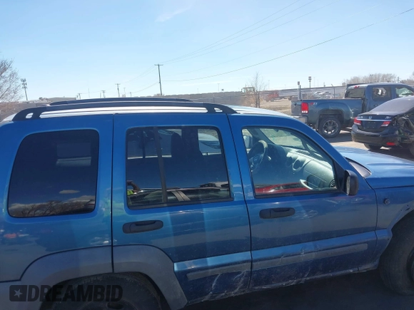 2005 Jeep Liberty Sport with VIN 1J4GK48K55W718275, listed as a IAAI auction lot 41869950 with 198,154 mi miles. Bid and sale history available at carsss.com. Image 14.