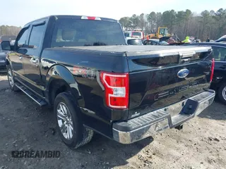 2018 Ford F-150 XL with VIN 1FTEW1E59JFB63307, listed as a IAAI auction lot 41652067 with 174,097 mi miles. Bid and sale history available at carsss.com. Image 3.