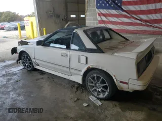 1989 Toyota MR2 z VIN JT2AW15J7K0154517, wystawiony jako Copart lot #77944134 z przebiegiem 204 412 mil mil oraz Szkody całkowita. Historia ofert i sprzedaży dostępna na DreamBid. Obrazek 2.