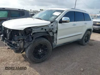 2011 Jeep Grand Cherokee Overland Summit with VIN 1J4RR6GT9BC586712, listed as a IAAI auction lot 42427655 with 157,549 mi miles and . Bid and sale history available at DreamBid. Image 2.