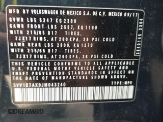 2018 Volkswagen Tiguan S z VIN 3VV1B7AX9JM043240, wystawiony jako Copart lot #72519764 z przebiegiem 129 138 mil mil oraz Szkoda całkowita • Salvage title. Historia ofert i sprzedaży dostępna na DreamBid. Obrazek 13.