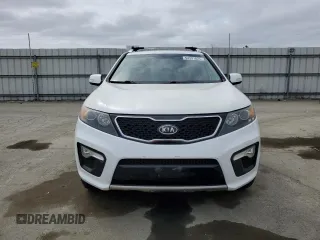 2012 Kia Sorento SX z VIN 5XYKWDA25CG280219, wystawiony jako Copart lot #54397025 z przebiegiem 197 685 mil mil oraz Szkoda całkowita • Salvage title. Historia ofert i sprzedaży dostępna na DreamBid. Obrazek 5.