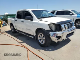 2010 Nissan Titan SE with VIN 1N6BA0ED4AN320540, listed as a Copart auction lot 51779065 with 252,827 mi miles and Salvage title. Bid and sale history available at DreamBid. Image 4.