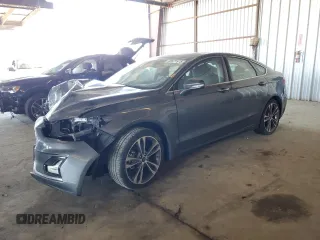 2020 Ford Fusion Titanium с VIN 3FA6P0K92LR115615, выставлен на аукционе Copart как лот 60471975 с пробегом 73 069 миль миль и Списание • Salvage title. История ставок и продаж доступна на DreamBid. Изображение 1.