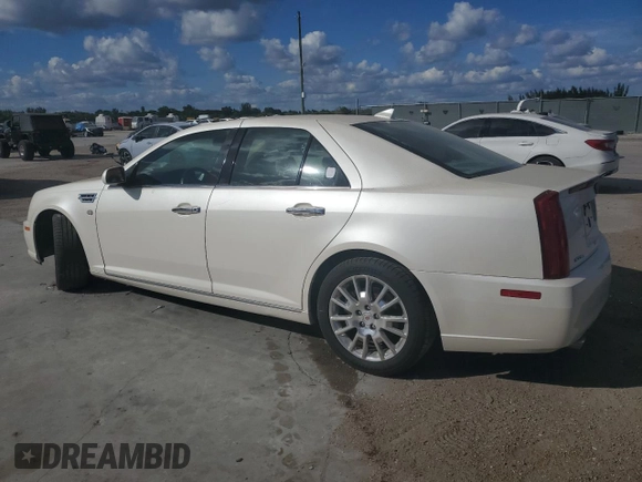 2010 Cadillac STS AWD z VIN 1G6DU6EV9A0138248, wystawiony jako Copart lot #85649154 z przebiegiem 137 227 mil mil oraz Nie do naprawy • Non repairable. Historia ofert i sprzedaży dostępna na DreamBid. Obrazek 2.