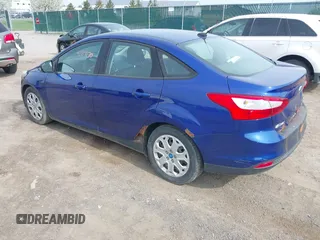 2012 Ford Focus SE with VIN 1FAHP3F21CL342199, listed as a IAAI auction lot 42119170 with 185,307 mi miles and . Bid and sale history available at carsss.com. Image 3.
