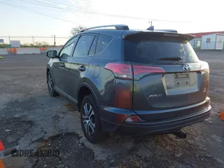 2016 Toyota RAV4 LE with VIN JTMBFREV1GD187414, listed as a IAAI auction lot 42033130 with 123,955 mi miles and . Bid and sale history available at carsss.com. Image 3.