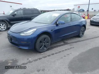 2021 Tesla Model 3 Long Range with VIN 5YJ3E1EB8MF848049, listed as a IAAI auction lot 40974331 with 61,462 mi miles. Bid and sale history available at carsss.com. Image 19.