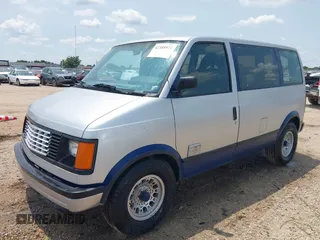 1987 Chevrolet Astro z VIN 1GNDM15Z5HB121813, wystawiony jako IAAI lot #42388922 z przebiegiem Nie podano mil oraz . Historia ofert i sprzedaży dostępna na DreamBid. Obrazek 2.