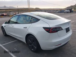 2022 Tesla Model 3 with VIN 5YJ3E1EA9NF375335, listed as a IAAI auction lot 41676024 with 18,836 mi miles. Bid and sale history available at carsss.com. Image 3.