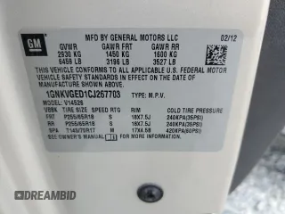 2012 Chevrolet Traverse 1LT z VIN 1GNKVGED1CJ267703, wystawiony jako Copart lot #56325335 z przebiegiem 199 101 mil mil oraz Szkoda całkowita • Salvage title. Historia ofert i sprzedaży dostępna na DreamBid. Obrazek 13.