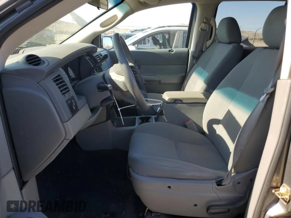 2006 Dodge Durango SXT with VIN 1D4HD38K16F128304, listed as a Copart auction lot 58182694 with 103,374 mi miles and Salvage title. Bid and sale history available at DreamBid. Image 7.