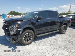 2023 Nissan Titan Pro-4X с VIN 1N6AA1ED2PN115843, выставлен на аукционе Copart как лот 52706855 с пробегом 54 540 миль миль и На запчасти • Non repairable. История ставок и продаж доступна на DreamBid. Изображение 1.