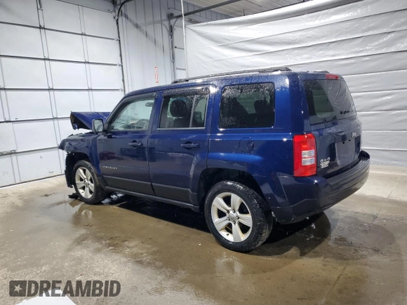 2014 Jeep Patriot Latitude with VIN 1C4NJRFB0ED852882, listed as a Copart auction lot 49674915 with 130,367 mi miles and Salvage title. Bid and sale history available at DreamBid. Image 2.