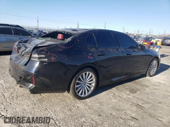 2024 BMW i5 eDrive40 with VIN WBY33FK03RCR92861, listed as a Copart auction lot 88443755 with 13,138 mi miles and Salvage title. Bid and sale history available at DreamBid. Image 3.