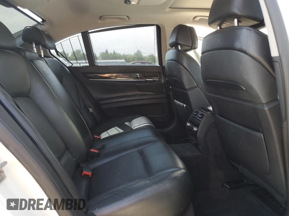2012 BMW 7 Series 750i xDrive with VIN WBAKC6C56CDX99416, listed as a Copart auction lot 54857715 with 114,198 mi miles and Salvage Title. Bid and sale history available at DreamBid. Image 10.