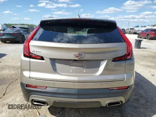 2023 Cadillac XT4 FWD Premium Luxury с VIN 1GYFZCR47PF105143, выставлен на аукционе Copart как лот 52397695 с пробегом 42 740 миль миль и На запчасти • Non repairable. История ставок и продаж доступна на DreamBid. Изображение 6.