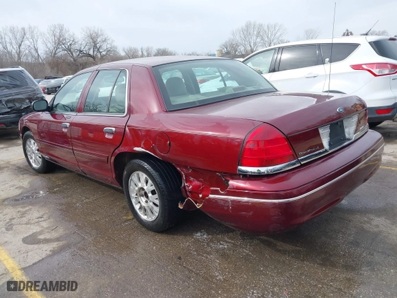 2005 Ford Crown Victoria LX with VIN 2FAFP74W25X106106, listed as a IAAI auction lot 41825793 with 175,740 mi miles. Bid and sale history available at carsss.com. Image 3.