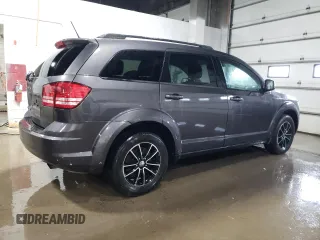 2017 Dodge Journey SE z VIN 3C4PDCAB5HT682795, wystawiony jako Copart lot #57478495 z przebiegiem 120 355 mil mil oraz Czysty tytuł • Clean title. Historia ofert i sprzedaży dostępna na DreamBid. Obrazek 3.