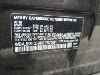 2019 BMW 5 Series M550i xDrive with VIN WBAJB9C59KB287501, listed as a Copart auction lot 59732425 with 74,345 mi miles and Salvage title. Bid and sale history available at DreamBid. Image 12.
