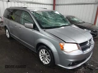 2018 Dodge Grand Caravan SXT z VIN 2C4RDGCG5JR240892, wystawiony jako IAAI lot #42416676 z przebiegiem 84 906 mil mil oraz . Historia ofert i sprzedaży dostępna na DreamBid. Obrazek 1.
