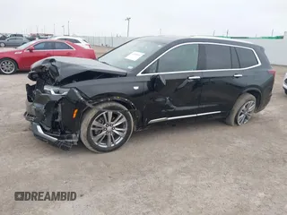 2023 Cadillac XT6 FWD Premium Luxury with VIN 1GYKPCRS8PZ231089, listed as a IAAI auction lot 41500954 with 36,455 mi miles and . Bid and sale history available at DreamBid. Image 6.