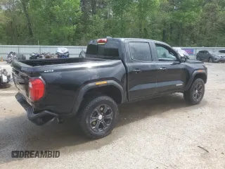 2023 GMC Canyon 4WD Elevation with VIN 1GTP6BEK0P1195086, listed as a Copart auction lot 51432045 with 25,713 mi miles and Salvage Title. Bid and sale history available at DreamBid. Image 3.