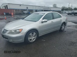 2006 Acura RL z VIN JH4KB16526C005279, wystawiony jako Copart lot #57917835 z przebiegiem 145 737 mil mil oraz Szkody całkowita. Historia ofert i sprzedaży dostępna na DreamBid. Obrazek 1.