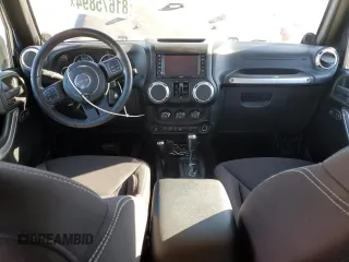 2013 Jeep Wrangler Unlimited Rubicon 10th Anniversary с VIN 1C4HJWFG7DL559539, выставлен на аукционе Copart как лот 81675894 с пробегом 99 425 миль миль и Списание • Salvage title. История ставок и продаж доступна на DreamBid. Изображение 8.