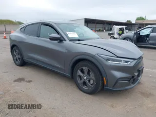 2021 Ford Mustang Mach-E Select z VIN 3FMTK1RM8MMA18120, wystawiony jako IAAI lot #42077686 z przebiegiem 71 626 mil mil oraz . Historia ofert i sprzedaży dostępna na DreamBid. Obrazek 1.
