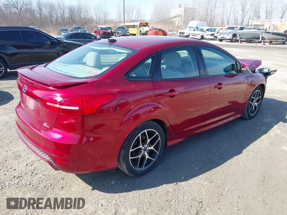 2015 Ford Focus SE with VIN 1FADP3F25FL273973, listed as a IAAI auction lot 41801026 with 138,482 mi miles. Bid and sale history available at carsss.com. Image 4.