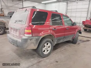 2006 Ford Escape XLT with VIN 1FMYU93176KD47219, listed as a IAAI auction lot 41785112 with 247,175 mi miles. Bid and sale history available at carsss.com. Image 4.